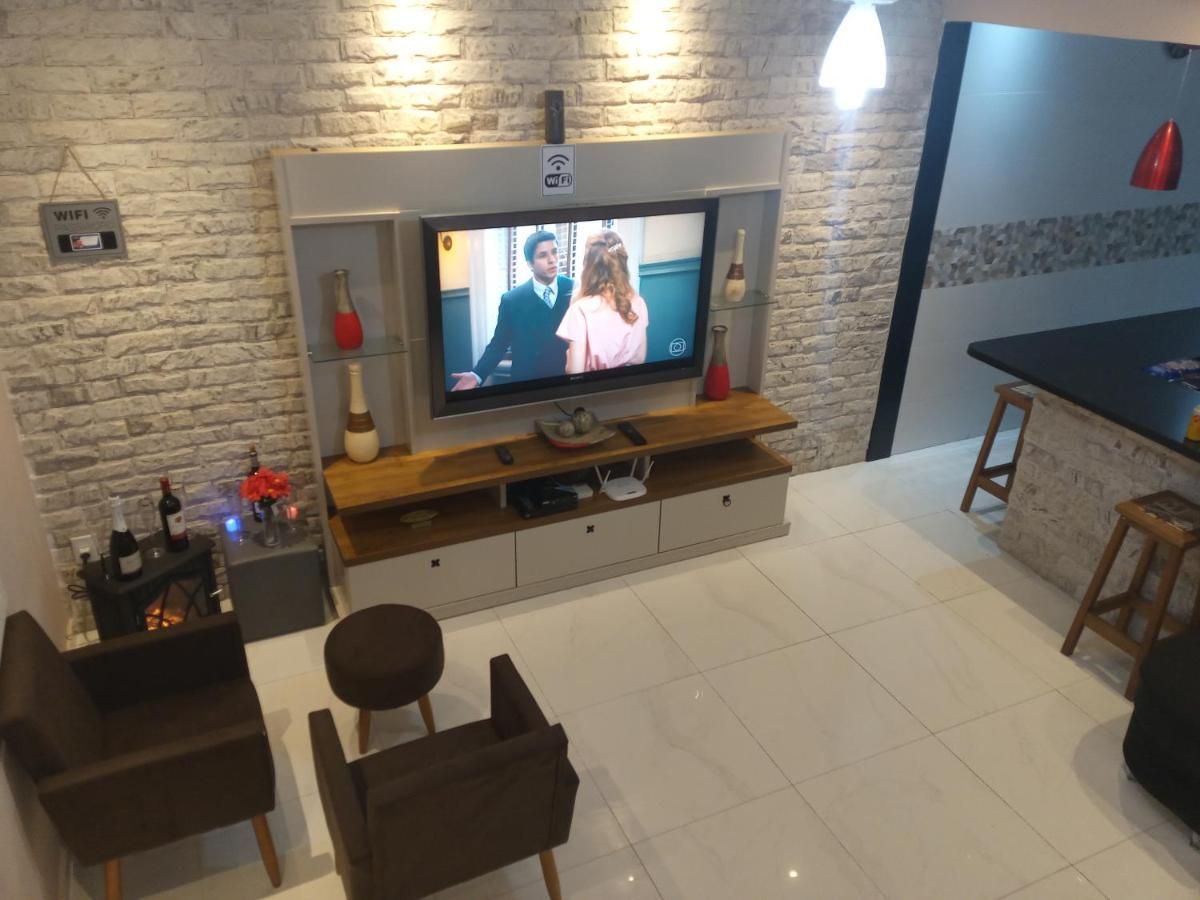 Casa Moderna E Aconchegante Com Opcao De Piscina Aquecida Cobrado A Parte, Ampla Area Gourmet Com Churrasqueira Em Deck Coberto Frente A Piscina, Aconchegante Sala De Estar Com Lareira, Ampla Garagem Para 4 Carros, Casa Pe Na Areia A 50 Metros Da Pra Praia Grande  Extérieur photo